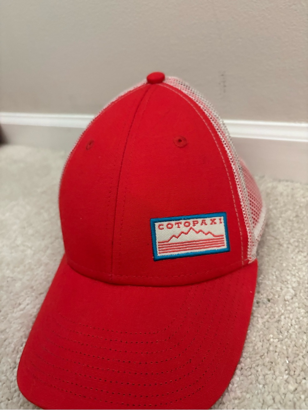 cotopaxi Red and White Mesh Trucker Hat with Mountain Patch